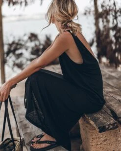 The Black Low Back Linen Tank Dress 13 The Black Low Back Linen Tank Dress -Modern Ladies Wear Store mikuta the black low back linen tank dress the small cesta bag the black studded leather sandals 0080