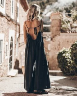 The Dark Flowy Jumpsuit 22 The Dark Flowy Jumpsuit -Modern Ladies Wear Store mikuta the dark flowy jumpsuit the black leather buckle sandals the large cesta bag 5308