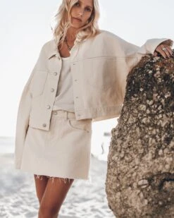 The White Cropped Denim Jacket 12 The White Cropped Denim Jacket -Modern Ladies Wear Store mikuta white cropped denim jacket white denim skirt white base tank top johanna r ss25 8211 1