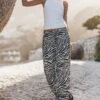 The Zebra Flowy Pants -Modern Ladies Wear Store mikuta white standard tank top zebra flowy pants 5420