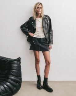 The White Tank Top -Modern Ladies Wear Store mikuta white tank top leather jacket black denim skirt black biker boots marie c SS25 1614
