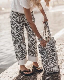 The Zebra Baggy Jeans 17 The Zebra Baggy Jeans -Modern Ladies Wear Store mikuta zebra baggy jeans white regular cotton t shirt black studded leather sandals zebra large canvas bag 0036 12fd41e9 82b1 49c7 b04d 2339095ac997